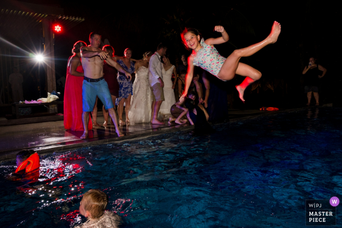 Photo by: <a href="https://www.wpja.com/contests/2019-v06/best-wedding-photographers/2491826">Khoi Le - Ho Chi Minh City </a> Salinda Resort Wedding Reception Photography of Pool Party at Night