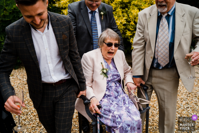 Photo by: <a href="https://www.wpja.com/contests/2019-v06/best-wedding-photographers/2492511">Annamarie Stepney - Horsham West Sussex</a> Farnham Castle, Farnham, Surrey, England Wedding Photo showing one way to move Granny!