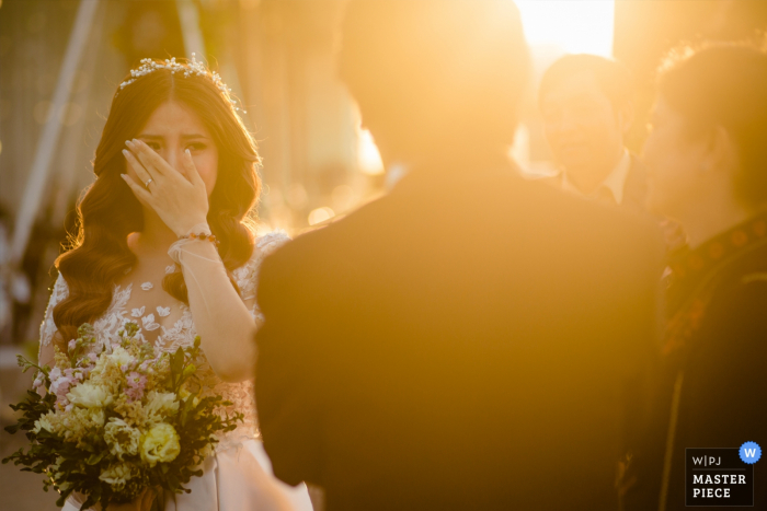 Photo by: <a href="https://www.wpja.com/contests/2019-v06/best-wedding-photographers/2493626">Vu Nguyen - Ho Chi Minh </a> River View Hotel / Can Tho Wedding Day Photography | Bride was crying after her father's speech.