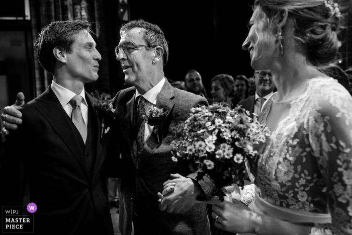 Photo by: <a href="https://www.wpja.com/contests/2019-v06/best-wedding-photographers/2494131">Leonard Walpot - Utrecht Utrecht</a> Vondelkerk Amsterdam photography - Wedding image of the father of the bride with bride and his son in law.