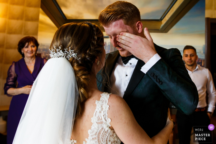 Photo by: <a href="https://www.wpja.com/contests/2019-v06/best-wedding-photographers/2494256">Petrica Tanase - Bucharest București</a> Wedding Photography at Bucharest - Mogosoaia Lake - The Groom reacts while first seeing his bride