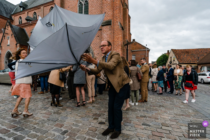 Photo by: <a href="https://www.wpja.com/contests/2019-v06/best-wedding-photographers/2494811">Simon Leclercq - Leuven Vlaams Brabant</a> Wedding Day Rain Photography at Koolputten Waasmunster - Belgian weather at it's best...
