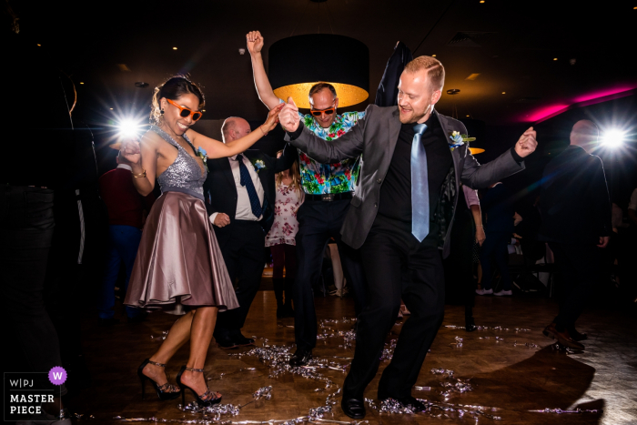 Photo by: <a href="https://www.wpja.com/contests/2019-v06/best-wedding-photographers/2495736">Jola Mulder - Deurningen Overijssel</a> Guests enjoy dancing on the dance floor during the reception in this image captured by an Overijssel, Netherlands wedding photographer.