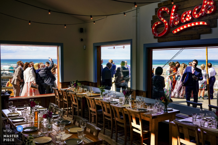 Photo by: <a href="https://www.wpja.com/contests/2019-v07/best-wedding-photographers/2498506">Andrew Billington - Leek Staffordshire</a> Wedding Photo from Harry's Shack Portstewart | The afternoon reception from inside Harry's Shack