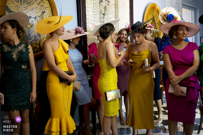 Photo by: <a href="https://www.wpja.com/contests/2019-v07/best-wedding-photographers/2498901">Jesus Merida - Malaga Malaga</a> Wedding Photography at Hacienda del Alamo - Waiting to see the bride - women with hats