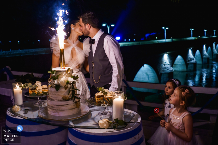 Photo by: <a href="https://www.wpja.com/contests/2019-v07/best-wedding-photographers/2501016">Boni Bonev - Sofia Sofia</a> Photography at The Bridge Restourant - Svilengrad, Bulgaria - The Cake kiss at the reception