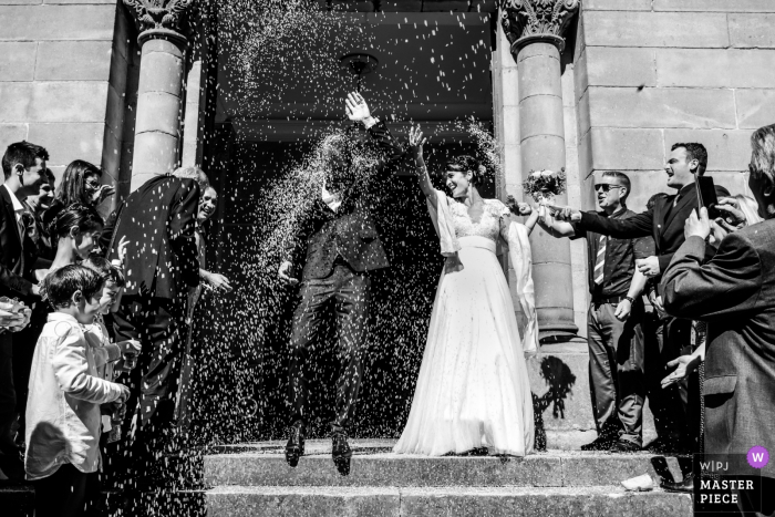 Photo by: <a href="https://www.wpja.com/contests/2019-v07/best-wedding-photographers/2501991">William Lambelet - Montpellier </a> Throwing lavender at the bride and groom following ceremony at Millau, France church