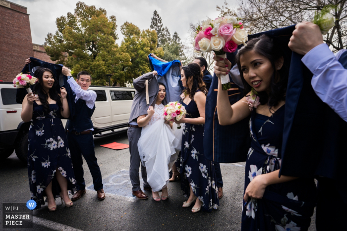 Photo by: <a href="https://www.wpja.com/contests/2019-v07/best-wedding-photographers/2502721">Vinci Wang - FuZhou </a> Stockton Wedding Photographer: "It was raining when preparing for the ceremony."
