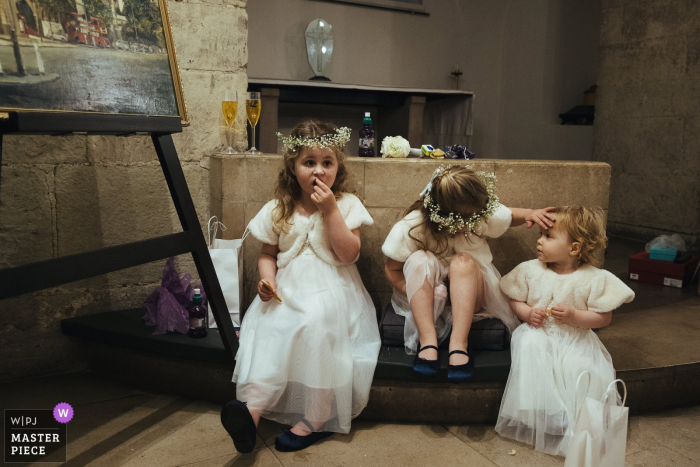 Photo by: <a href="https://www.wpja.com/contests/2019-v07/best-wedding-photographers/2503451">Lyndsey Goddard - London London</a> Clement St Danes Church, London Wedding Photography | The flowergirls after the ceremony