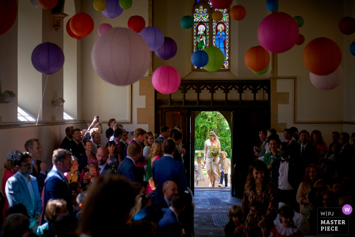 Photo by: <a href="https://www.wpja.com/contests/2019-v07/best-wedding-photographers/2503756">Martin Beddall - Horsham West Sussex</a> Plush Manor, Dorset, UK Photography | Bride enters the chapel, with her children during ceremony