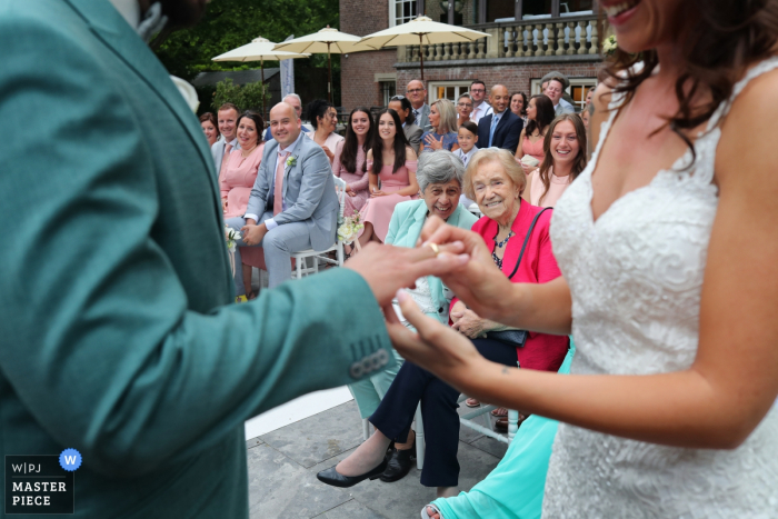 Photo by: <a href="https://www.wpja.com/contests/2019-v07/best-wedding-photographers/2504916">Peter Kos - Haarlem Noord Holland</a> Wassenaar Wedding Photos - two grandmothers enjoying the ring ceremony