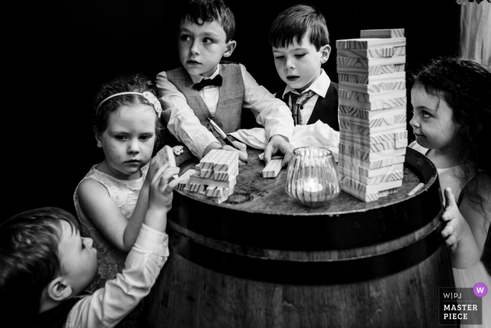 Photo by: <a href="https://www.wpja.com/contests/2019-v07/best-wedding-photographers/2506896">Annie Kheffache - Dun Laoghaire Dublin</a> Medley, Dublin Ireland Photo of Kids taking the signing board very seriously