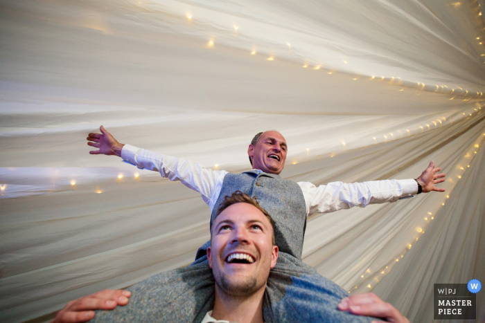 Photo by: <a href="https://www.wpja.com/contests/2019-v07/best-wedding-photographers/2507591">Martin Dabek - Bristol Bristol</a> Penterry Farm Wedding Reception Photographer - Father of the bride broke his leg on the stag due, but still wanted to be close to the action on the dance floor
