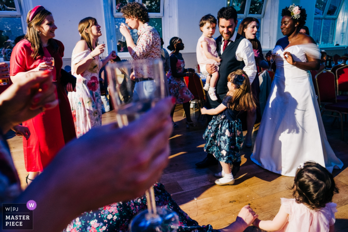 Vestry Hall, Sutton, UK reception photography showing dance floor chaos 