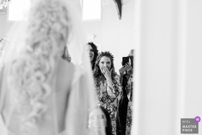 Photo by: <a href="https://www.wpja.com/contests/2019-v07/best-wedding-photographers/2507981">Michelle Arlotta - Milford New Jersey</a> Bear Brook Valley New Jersey Wedding Image of bridesmaids seeing the bride in her dress.