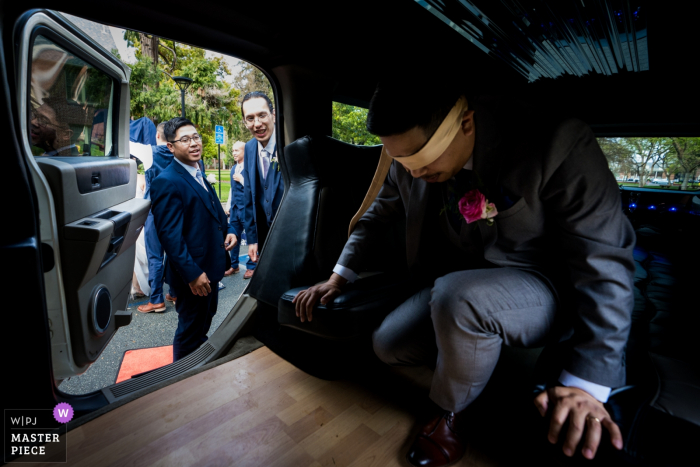 San Jose CA wedding photography. Before the first look, the groom was covered over his eyes. 