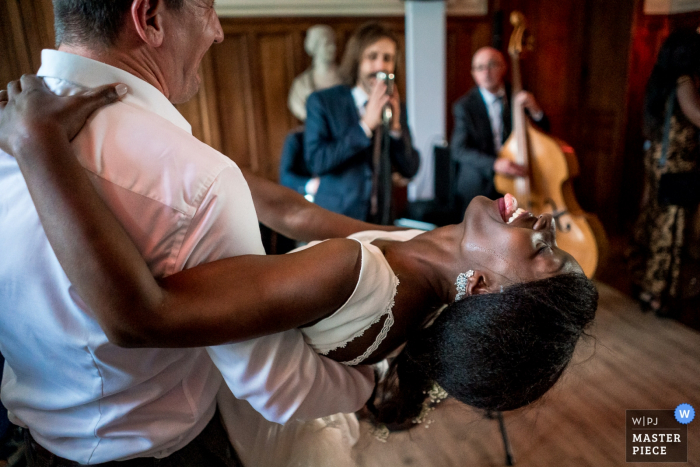 Photo by: <a href="https://www.wpja.com/contests/2019-v08/best-wedding-photographers/2514036">Sybil Rondeau - Nantes </a> Bride dancing during reception at the Château d'Azy - Wedding Reception Photography