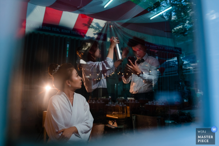 Photo by: <a href="https://www.wpja.com/contests/2019-v08/best-wedding-photographers/2519196">Vu Nguyen - Ho Chi Minh </a> Saiggon, Vietnam School Yard Wedding Photography. Bride and groom were getting ready.