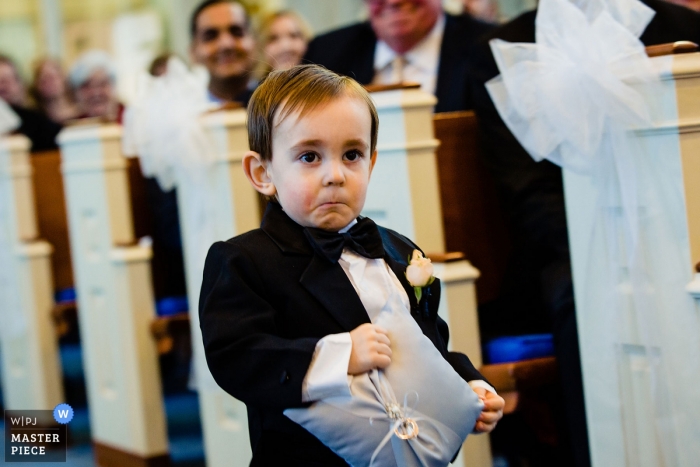 Photo by: <a href="https://www.wpja.com/contests/2019-v09/best-wedding-photographers/2530921">Miguel Gonzalez - Abington Pennsylvania</a> Wayne United Methodist Church, PA Photography - Little man was not feeling coming down the aisle by himself.