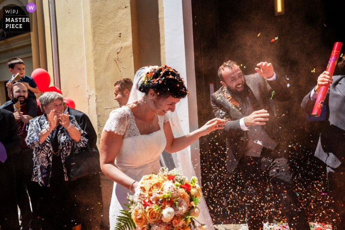 Photo by: <a href="https://www.wpja.com/contests/2019-v09/best-wedding-photographers/2533241">Maurizio Gjivovich - Ivrea Torino</a> Chiesa di Samone canavese TO - Church wedding photography of the colors captured in the bride's rice throwing
