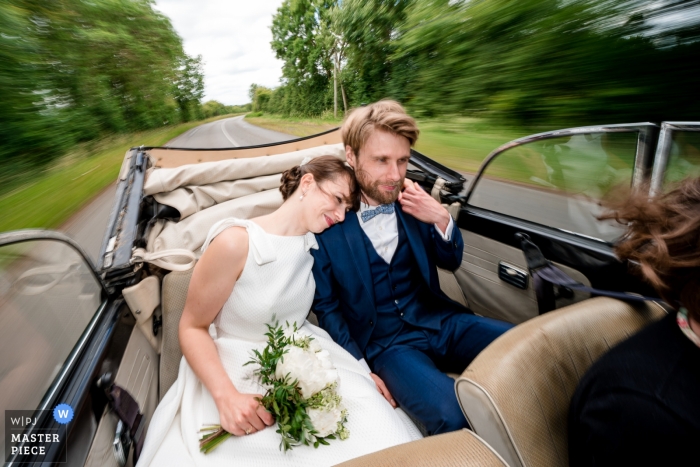 Photo by: <a href="https://www.wpja.com/contests/2019-v09/best-wedding-photographers/2533776">Sybil Rondeau - Nantes </a> Bride and groom on their way to the ceremony at Domaine des Forges