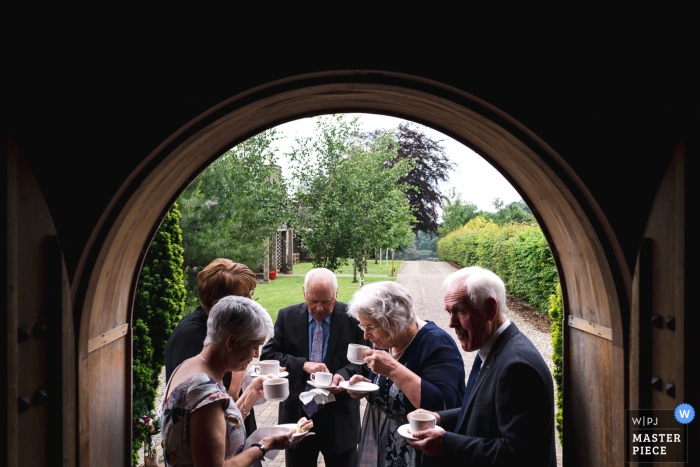 Photo by: <a href="https://www.wpja.com/contests/2019-v09/best-wedding-photographers/2534256">Rich Calver - Lisburn County Antrim</a> Lissanoure Castle, Glens of Antrim Wedding Venue - Photography of Irish guests enjoying a cup of tea