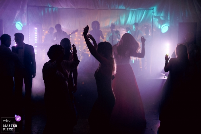 Photo by: <a href="https://www.wpja.com/contests/2019-v09/best-wedding-photographers/2534451">Dominic Whiten - Leiston Suffolk</a> Suffolk, UK Wedding Reportage Photographer - Guests dancing to soul band at evening party
