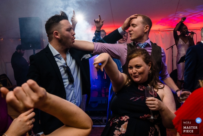 Photo by: <a href="https://www.wpja.com/contests/2019-v09/best-wedding-photographers/2536881">James Tracey - Oldham Lancashire</a> Roseleigh wedding reception photograph of guest partying on the dance floor