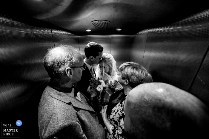 Photo by: <a href="https://www.wpja.com/contests/2019-v09/best-wedding-photographers/2538791">Niels Gerhardt - Frankfurt Hessen</a> Neroberg Wiesbaden Germany Doucmentary Wedding Photo of Bride and groom in elevator