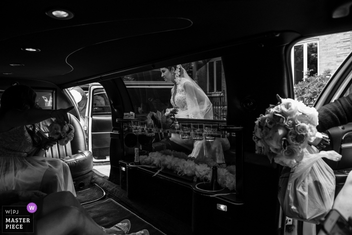Photo by: <a href="https://www.wpja.com/contests/2019-v09/best-wedding-photographers/2539476">Adeline Leonti - Montreal Quebec</a> Photo of bride leaving for the ceremony - Place d'Armes Hotel, Montreal wedding day photographer