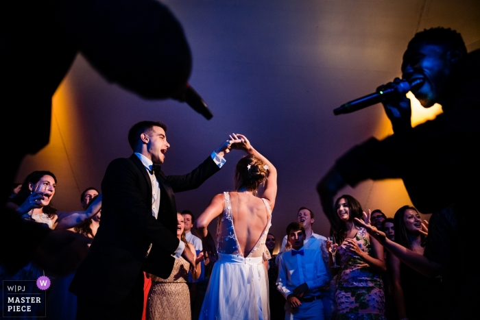 Hildene, Manchester, Vermont Wedding Photographer - The bride and groom in the middle of the action on the dance floor 