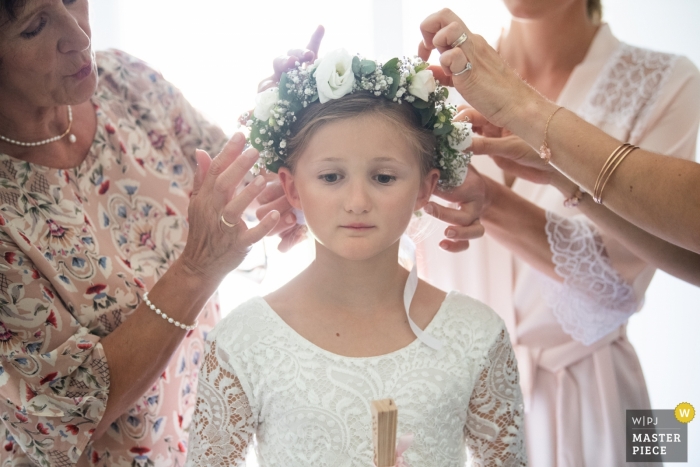 Photo by: <a href="https://www.wpja.com/contests/2019-v09/best-wedding-photographers/2542211">David Zaoui - Miami Florida</a> Aix en Provence, Moulin de la recense - Photos of getting ready of young flower girl with flowers in her hair