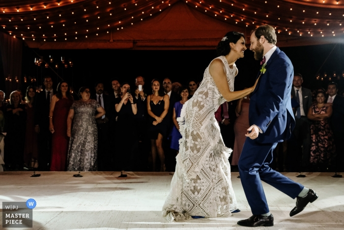 Photo by: <a href="https://www.wpja.com/contests/2019-v10/best-wedding-photographers/2542446">Nikhol Esteras - Oaxaca de Juárez Oaxaca</a> Wedding photograph of the bride and groom during their first dance at Jardin Etnobotanico de Oaxaca