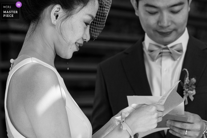 Photo by: <a href="https://www.wpja.com/contests/2019-v10/best-wedding-photographers/2542525">Xiaoye Sun - Beijing </a> Beijing bride cries as she reads a letter with her groom on wedding day..