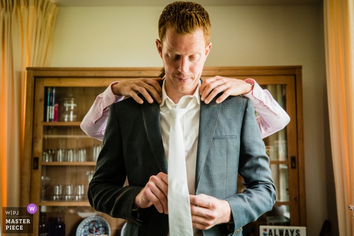 Photo by: <a href="https://www.wpja.com/contests/2019-v10/best-wedding-photographers/2542900">Karin Bunschoten - Leusden Utrecht</a> Bij Ons - Wellewaard wedding photography showing the Groom getting ready