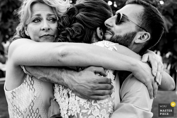 Photo by: <a href="https://www.wpja.com/contests/2019-v10/best-wedding-photographers/2543230">Philippe Swiggers - Bekkevoort </a> Masseria Don Luigi Family Hug Photo on Wedding Day.