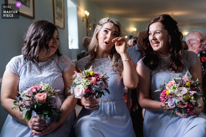 Photo by: <a href="https://www.wpja.com/contests/2019-v10/best-wedding-photographers/2543249">Rich Calver - Lisburn County Antrim</a> A bridesmaid tears up during wedding ceremony at the Lissanoure Castle, Glens of Antrim.
