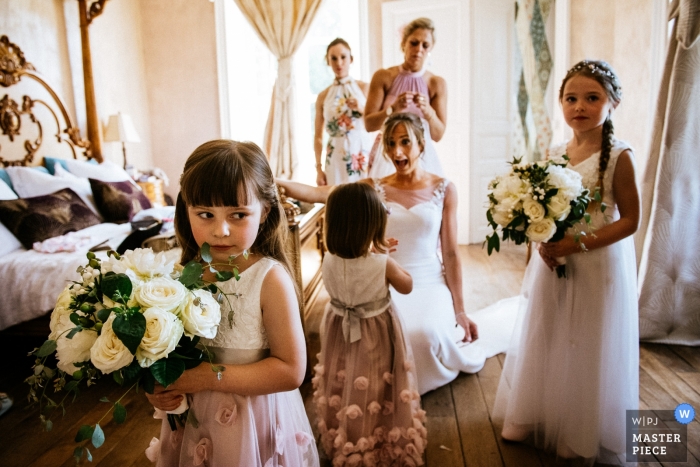 Photo by: <a href="https://www.wpja.com/contests/2019-v10/best-wedding-photographers/2543698">Lukas Powroziewicz - Edinburgh Midlothian</a> Chateau de La Motte Husson, France Wedding Photos | Bride and bridal party minutes before the ceremony