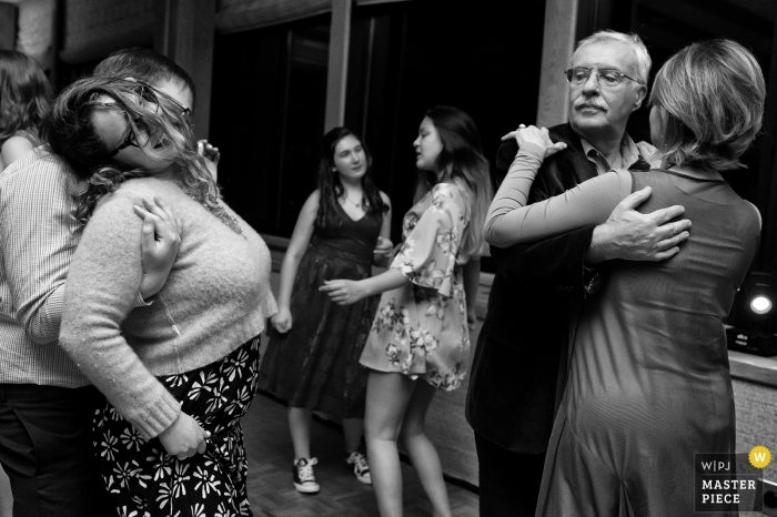 Photo by: <a href="https://www.wpja.com/contests/2019-v10/best-wedding-photographers/2543708">Tara Theilen - Carson City Nevada</a> Granlibakken, Tahoe City, CA Wedding Photojournalism - Photo showing the dancing generation gap