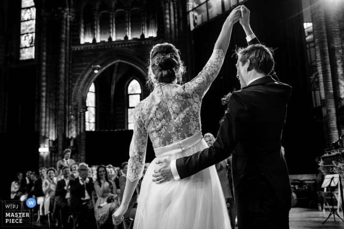 Photo by: <a href="https://www.wpja.com/contests/2019-v10/best-wedding-photographers/2543817">Leonard Walpot - Utrecht Utrecht</a> Vondelkerk Amsterdam wedding photo of the bride and groom - - expression during ceremony