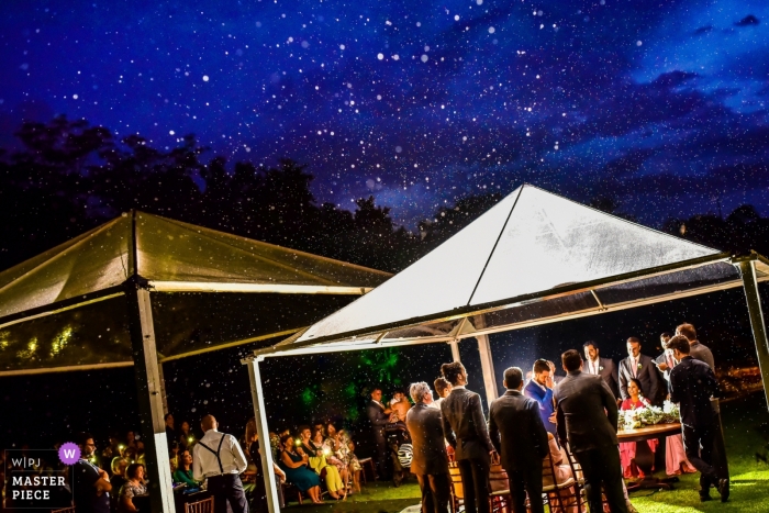 Photo by: <a href="https://www.wpja.com/contests/2019-v10/best-wedding-photographers/2543850">Vinicius Fadul - Campinas São Paulo</a> Wedding Photographer fo Plantarum - Nova Odessa | Rain over tent wedding ceremony