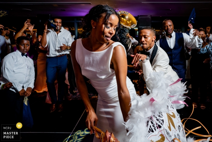 Photo by: <a href="https://www.wpja.com/contests/2019-v10/best-wedding-photographers/2543905">Brittany Diliberto - Arlington Virginia</a> University of Maryland, College Park, MD Wedding Photographer | The bride and groom bring in the Second Line Band at the end of the reception