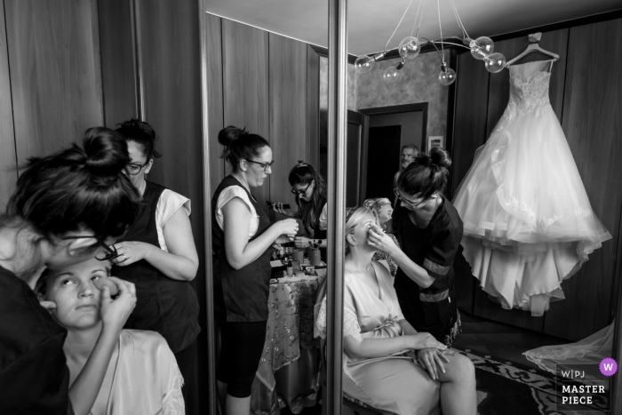 Photo by: <a href="https://www.wpja.com/contests/2019-v11/best-wedding-photographers/2544523">Fabrizio Demasi - Gonzaga Mantova</a> Black and white wedding photo of the bride with her mother as make-up applied in preparation for her wedding at Casa della Sposa