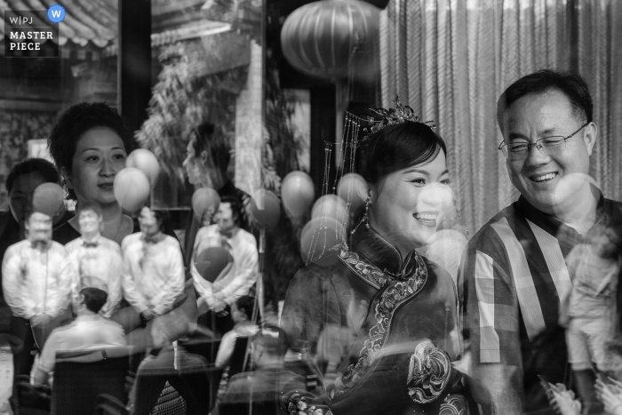 Photo by: <a href="https://www.wpja.com/contests/2019-v11/best-wedding-photographers/2544606">Xiaoye Sun - Beijing </a> Beijing China black and white actual day wedding photos of the bride.