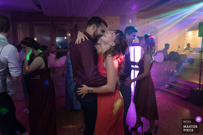 Photo by: <a href="https://www.wpja.com/contests/2019-v11/best-wedding-photographers/2544766">Samantha Lunder - Vufflens-la-Ville Vaud</a> Photo of two lovers during the evening party of a wedding in Switzerland