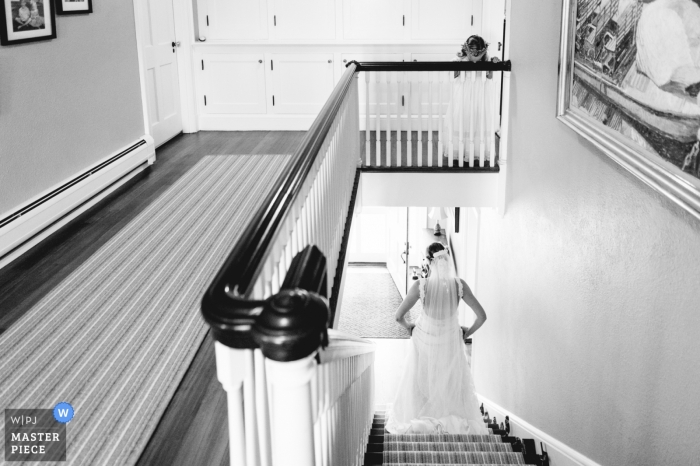 Photo by: <a href="https://www.wpja.com/contests/2019-v11/best-wedding-photographers/2544927">Stephen Grigoriou - Boston Massachusetts</a> New Hampshire bride leaving her home to go to the ceremony at her Bald Peak Colony Club wedding.