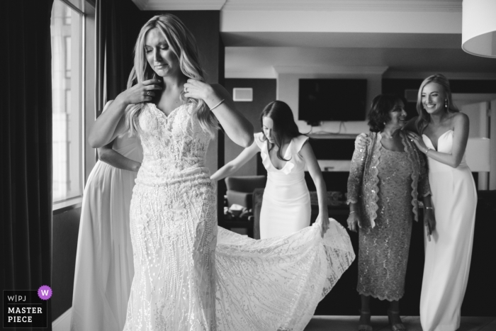 Photo by: <a href="https://www.wpja.com/contests/2019-v11/best-wedding-photographers/2546194">Dennis Crider - Loudonville Ohio</a> Ohio Hotel Getting Ready Photography - Emotional faces when the bride is almost ready for the wedding ceremony.