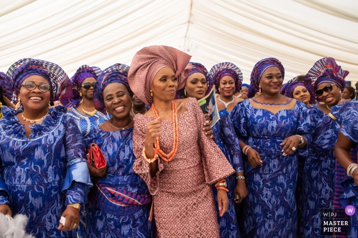 Photo by: <a href="https://www.wpja.com/contests/2019-v11/best-wedding-photographers/2546504">Obi Nwokedi - London London</a> St Margret's Church, Chipstead, UK Wedding Reportage Photographer - Mother of the groom and friends
