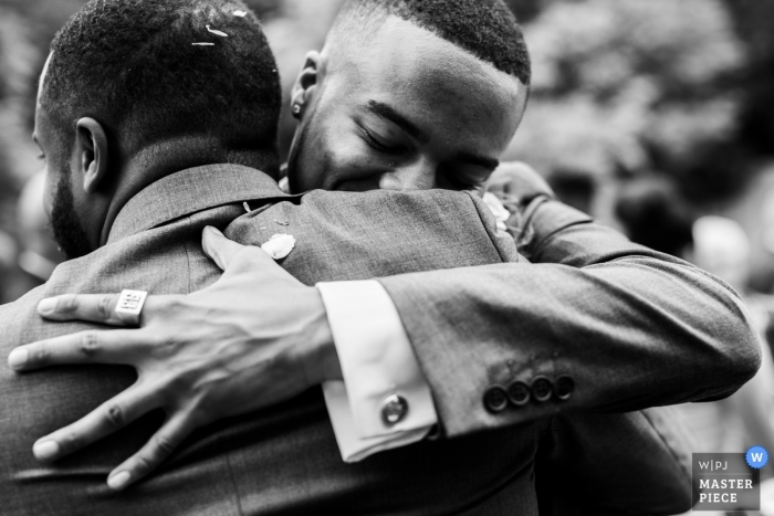 Photo by: <a href="https://www.wpja.com/contests/2019-v12/best-wedding-photographers/2547401">Chaiyasith Junjuerdee - Fulham London</a> Merton Register Office, London Wedding Reportage Photographer - Image showing Family love - Chesham Wedding Photography