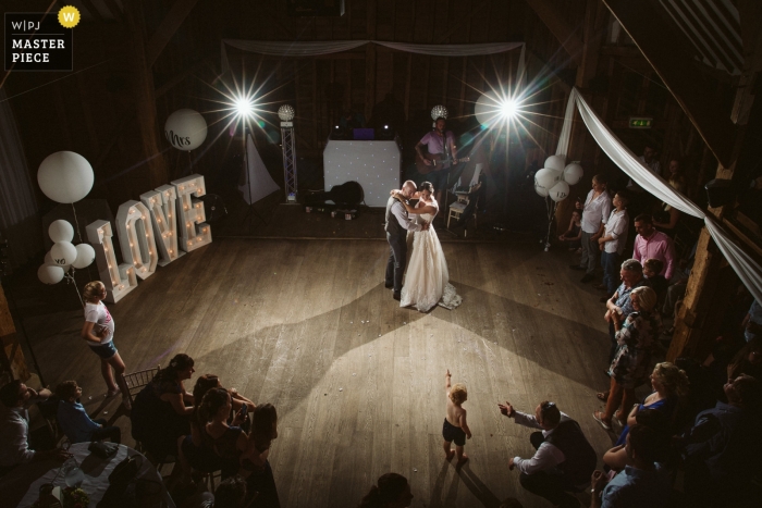 Tewin Bury Farm Hotel, UK Wedding Reportage Photo | Little Kid spotted his parents dancing for the first time as Husband and Wife - Chesham Wedding Photographer